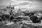PREPARING FISHING NETS